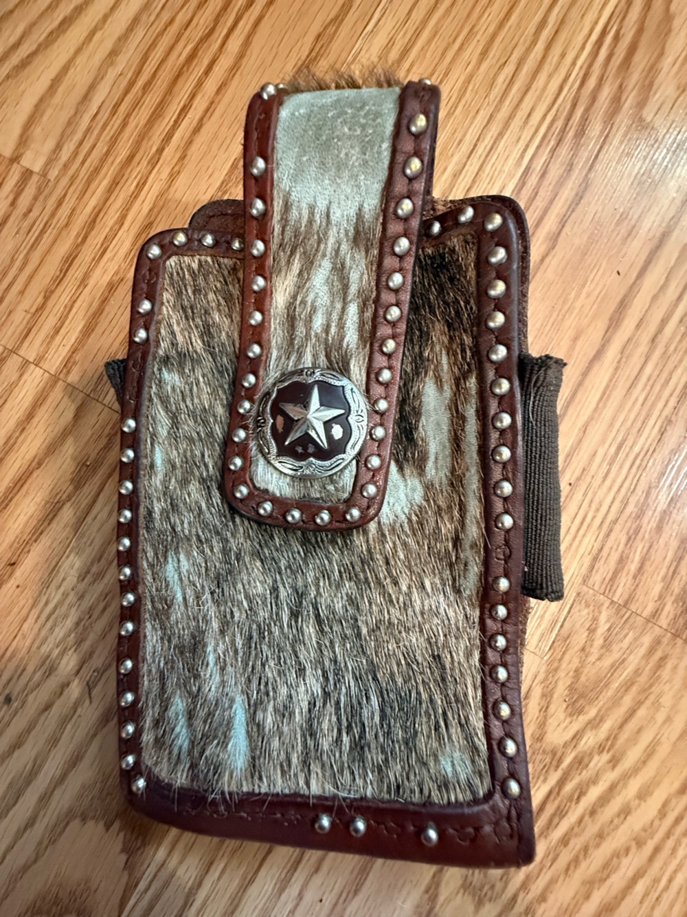 Nocona tan,brown roan hair-on leather phone case & silver studs and star concho